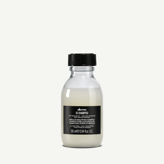 Bottle of Davines OI Shampoo with roucou oil for all hair types