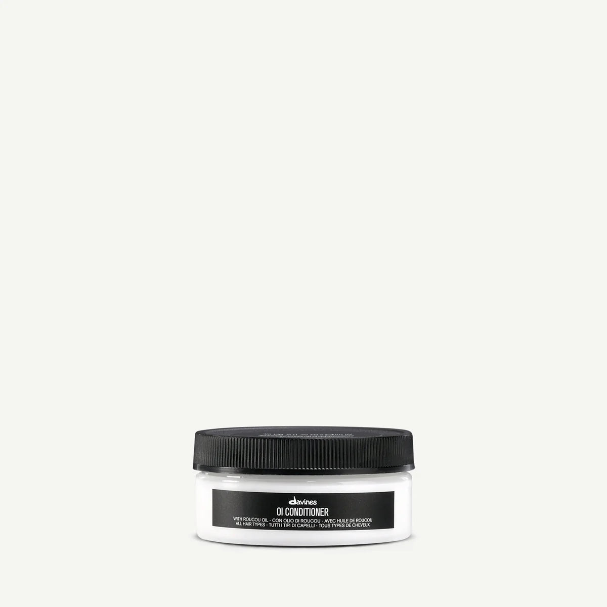 Jar of Davines OI Conditioner with roucou oil for all hair types