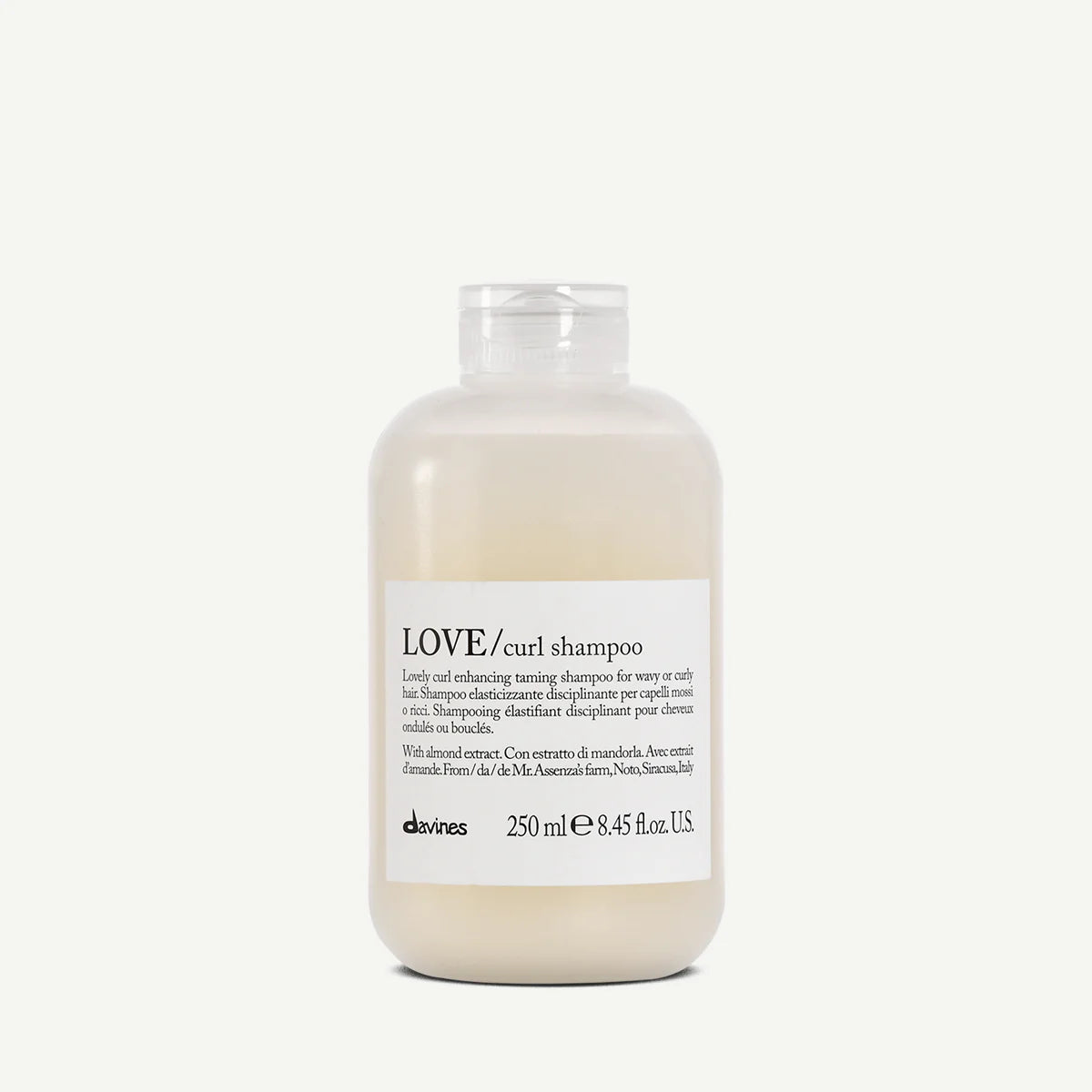 Bottle of Davines LOVE curl enhancing taming shampoo for wavy or curly hair