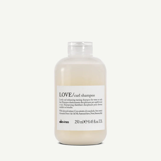 Bottle of Davines LOVE curl enhancing taming shampoo for wavy or curly hair