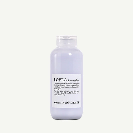 Bottle of Davines LOVE smoothing thermal serum for coarse or frizzy hair