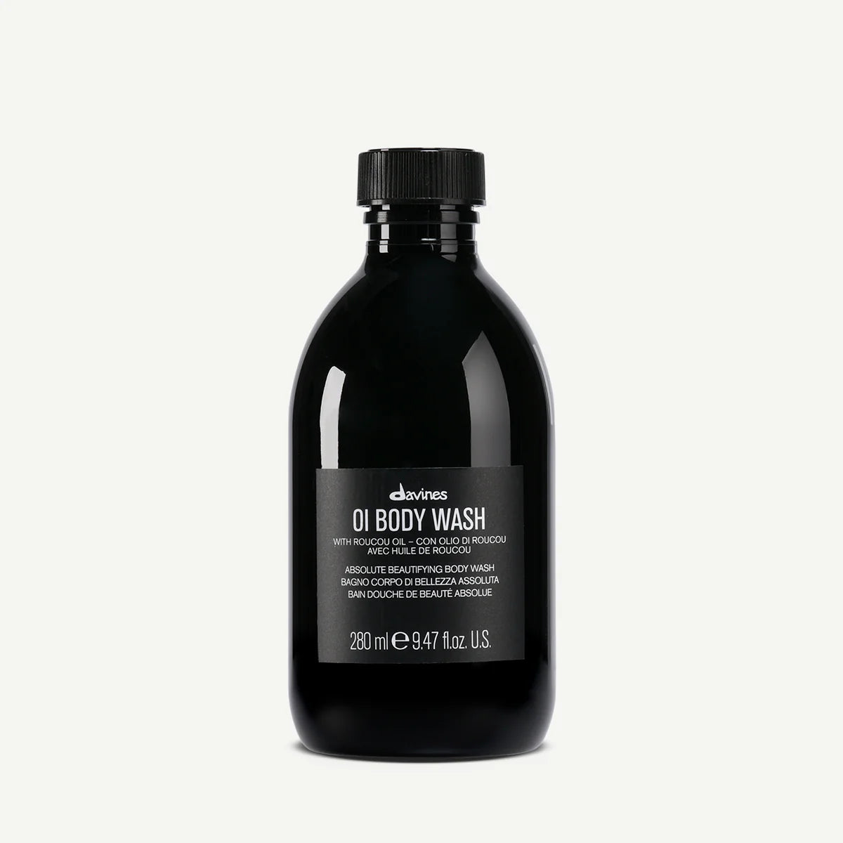 Black bottle of davines OI Body Wash  with roucou oil for absolute beautifying