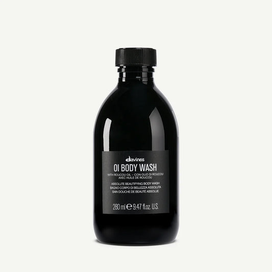 Black bottle of davines OI Body Wash  with roucou oil for absolute beautifying