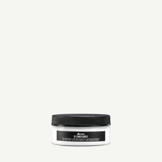 Jar of Davines OI Conditioner with roucou oil for all hair types