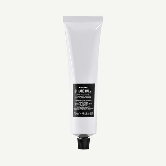 Tube of Davines OI Hand Balm with roucou oil for nourishing beautifying