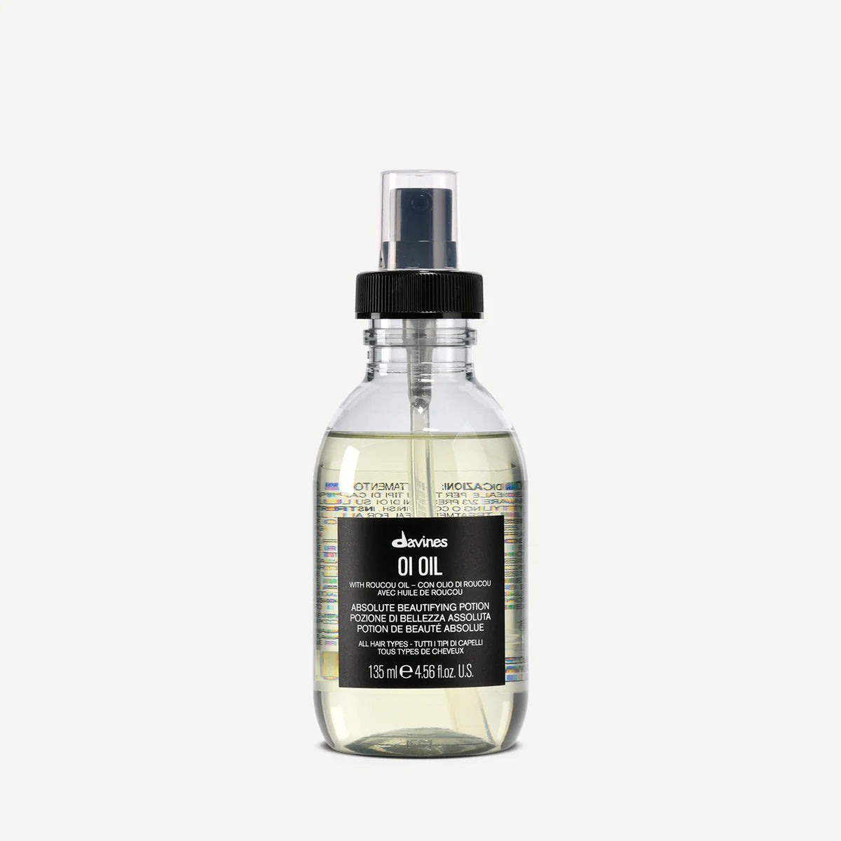 Bottle of Davines OI Oil 135 ml with roucou oil for all hair types Absolute Beautifying Potion